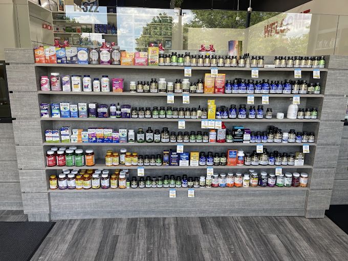 A full wall of vitamins and supplements at Orland Pharmacy